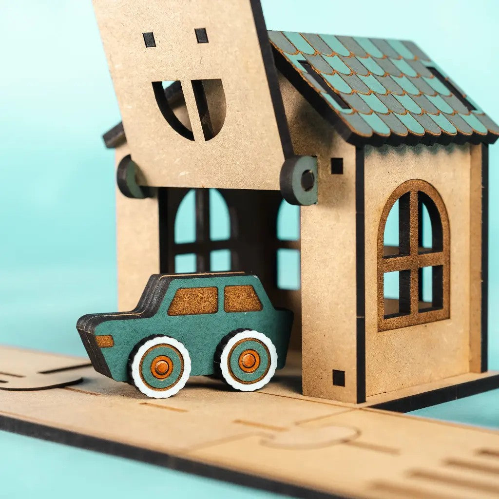 Crossroad Cottage – Colour-Your-Own Wooden Toy Garage